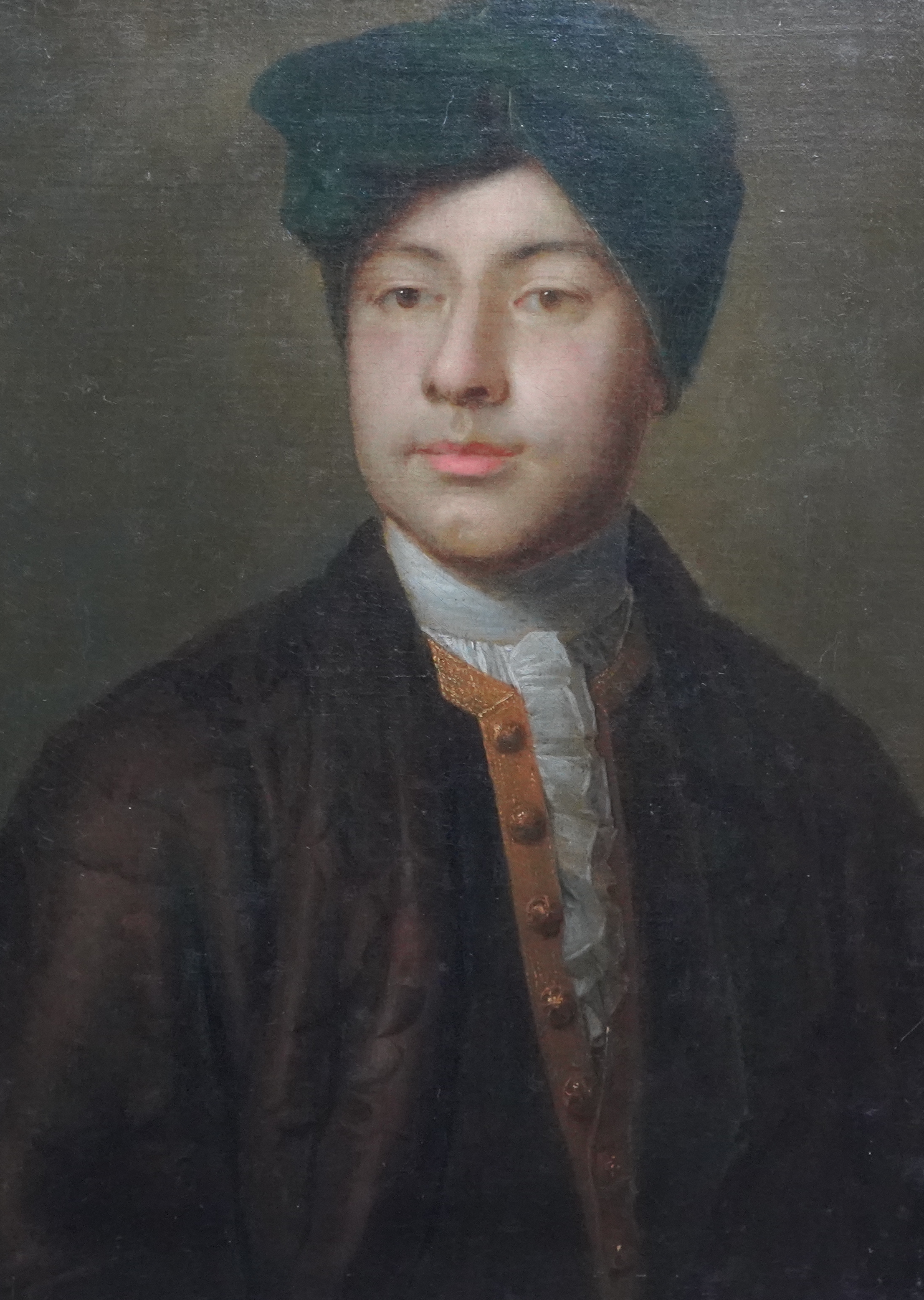 18th century English School , Half length portrait of a gentleman wearing a green turban, oil on canvas, 57 x 40cm